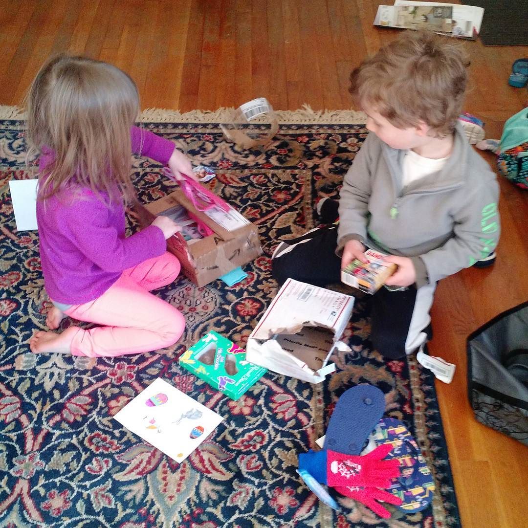 Tearing open their packages from Grandma Bette and Grandpa Mike.
