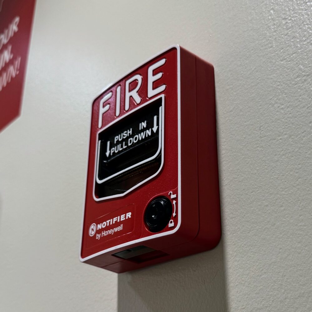 Fire alarm. It’s red. 
